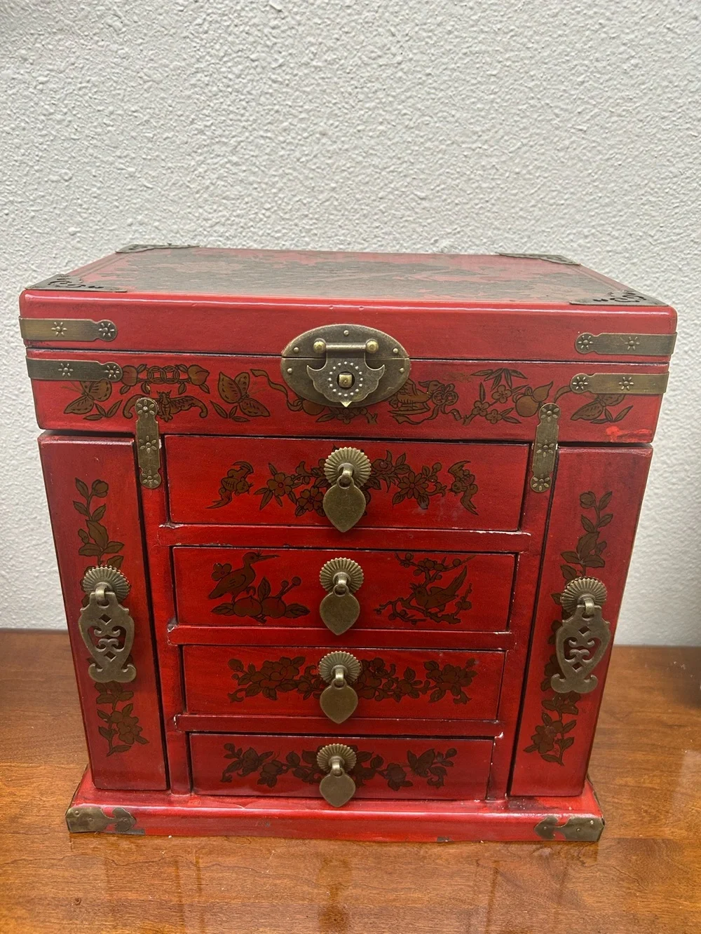 vintage Chinese-style red lacquered wooden jewelry chest ornate brass-toned